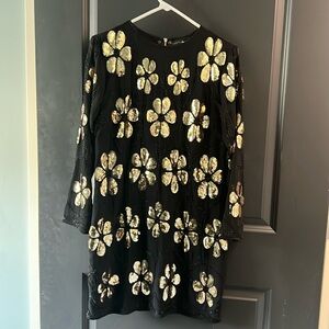 Black and gold beaded dress with high neck